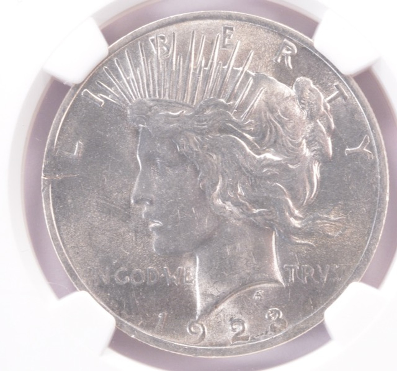 NGC $1 1923 Peace Dollar Cracked Planchet at K-9:30 MS62